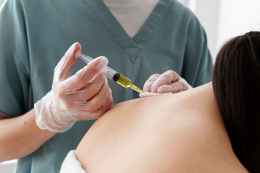 Medical professional administering injection therapy for neck pain relief to help patients stay active in Georgia